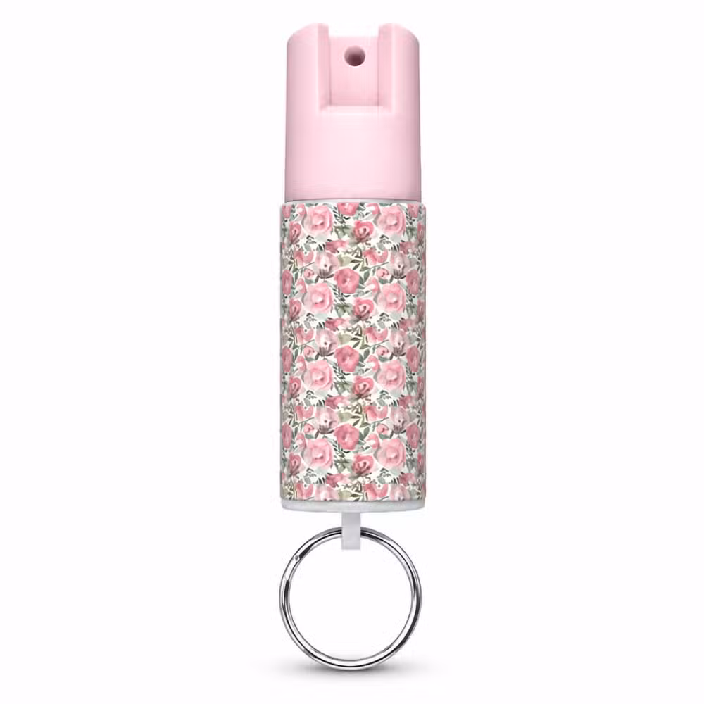 Gas pimienta SABRE RED floral rosado de 15 g con llavero